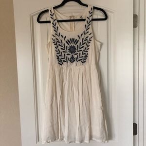 Ivory dress with blue embroidery